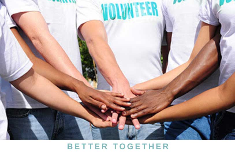 Volunteer Putting Hands Together - Better Together